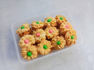 Kue Semprit or Semprit cookies, Indonesian cookies popular during eid mubarak. Semprit cookies topped with colorful icing.