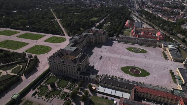 Aerial panoramic drone view of Schonbrunn and gardens, the Gloriette, UNESCO World Heritage Site, with Vienna in the background, Vienna