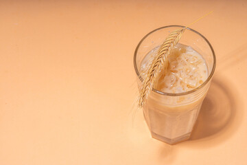 Iced barley orzo latte coffee, iced organic alternative coffee drink with crushed ice and non-dairy...