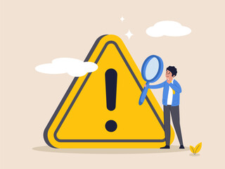 Critical failure concept. Incident management, root cause analysis or solving problem, identify risk, businessman with magnifier monitor and investigate incident with exclamation attention sign.