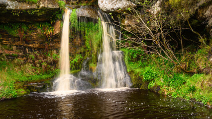 Waterfall in Sills Burn at Upper Coquetdale, a tributary of the River Rede located within the...