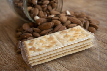 Fototapeta na wymiar shelled almonds and crackers
