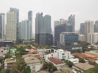 Naklejka premium View on tall buildings looking outside to see many buildings, Thailand buildings