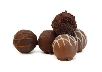 Chocolate candies collection. Beautiful Belgian truffles isolated on white background
