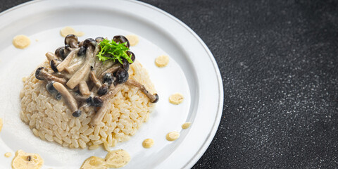 rice with mushrooms risotto healthy meal food snack on the table copy space food background rustic top view keto or paleo diet veggie vegan or vegetarian food no meat