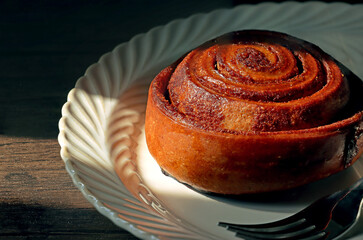cinnamon rolls on white plate