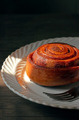 cinnamon rolls on white plate