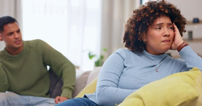 Sad couple, thinking and conflict in home for marriage problem, cheating or infidelity. Stress, divorce and man and woman on sofa in living room for breakup fight, depressed and relationship fail.