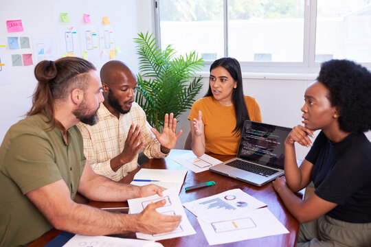 Four diverse developers argue during code review, deadline pressure
