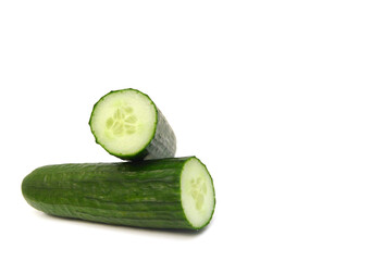 Cucumber and slices isolated over white background.