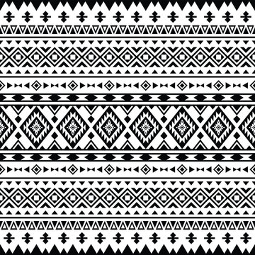 Tribal unique ornament background design with geometric abstract shapes. Seamless ethnic pattern. Folk style. Black and white colors. Design for textile, fabric, curtain, rug, ornament, background.