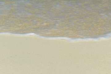 wave and white sand
