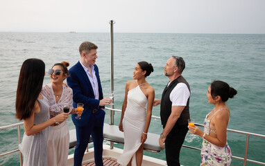 group of friends having fun and party celebrating on luxury yacht