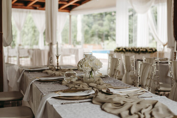 Beautiful wedding venue with white and beige details decoration