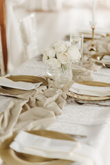 Fototapeta na wymiar Beautiful wedding venue with white and beige details decoration