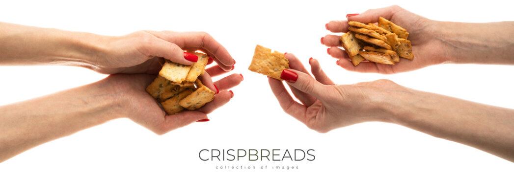 Italian crispbreads isolated on a white background. crackers in female hands. Woman holding crackers isolated on white. High quality photo