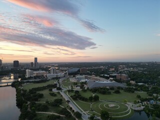 Town Lake, aka Ladybird Lake overlooking three bridges: Mopac Union Pacific Rail Road Bridge, Pfluger pedestrian Bridge, Lamar Boulevard Bridge. Plus the west Austin hills in 

the background.