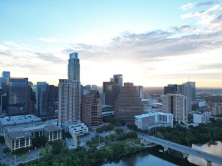 Fototapeta premium Town Lake, aka Ladybird Lake overlooking three bridges: Mopac Union Pacific Rail Road Bridge, Pfluger pedestrian Bridge, Lamar Boulevard Bridge. Plus the west Austin hills inthe background.