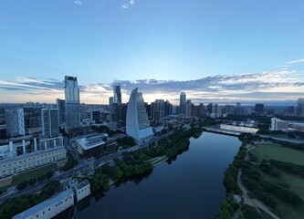 Fototapeta premium Town Lake, aka Ladybird Lake overlooking three bridges: Mopac Union Pacific Rail Road Bridge, Pfluger pedestrian Bridge, Lamar Boulevard Bridge. Plus the west Austin hills inthe background.