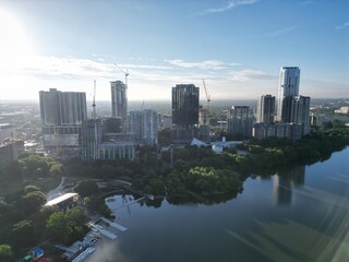 Naklejka premium Town Lake, aka Ladybird Lake overlooking three bridges: Mopac Union Pacific Rail Road Bridge, Pfluger pedestrian Bridge, Lamar Boulevard Bridge. Plus the west Austin hills inthe background.