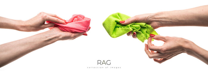 Rag microfiber in female hand with red nails, isolated on a white background