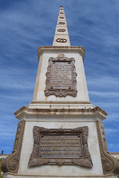 Obelisk monument to Torrijos in Plaza de la Merced, Malaga, Spain