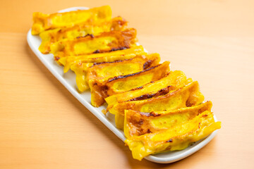 Traditional Japanese dumplings on grill