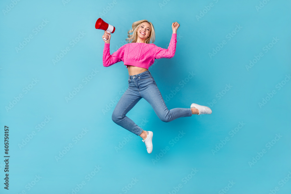 Poster Full length size photo of energetic happiness woman wear pink sweater fist up hold megaphone hooray shopping isolated blue color background