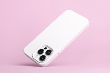 iPhone 14 Pro max starlight in white soft silicone case falls down back view, phone cover mockup...