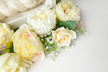 Flowers heads of white peonies. Floral layout. Mourning or funeral background. holiday background