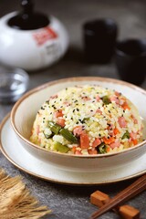 Fried rice with eggs, sausages and vegetables