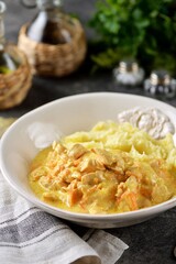 Turkey fillet stewed in cream with mashed potatoes.
