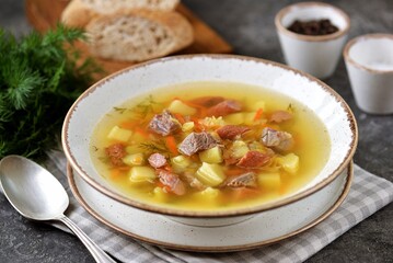 Pea soup with smoked sausages and beef
