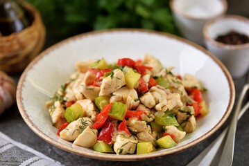 Chicken fillet stewed with zucchini, peppers, tomatoes, onions and garlic.