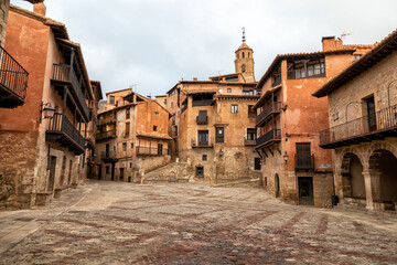 Traditional medieval style architecture in the main square of Albarracin, Teruel. Spain - obrazy, fototapety, plakaty
