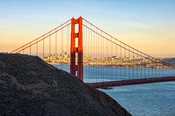 Golden Gate Bridge anf San Francisco City Scape at sunset, seen from Golden Gate View Point, San...