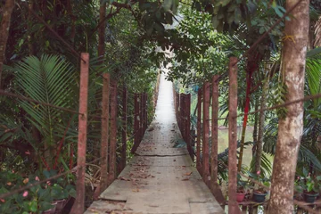 Fotobehang Bridge in jungle © Galyna Andrushko