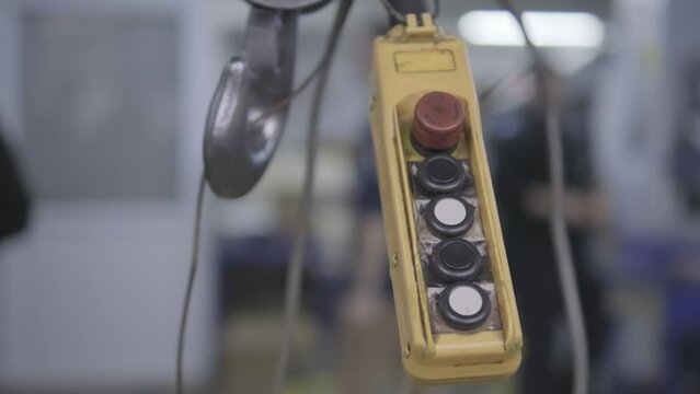 crane control in a factory. Portable control station of construction crane