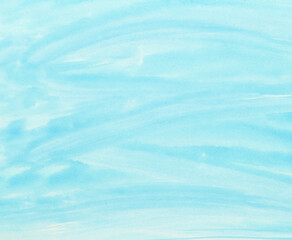 Abstract blue watercolor background. The color splashing on the paper. Hand drawn.