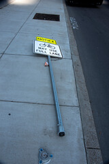 Street sign knocked over