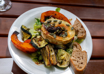 Healthy vegetarian food, Grilled vegetables with goat cheese salad