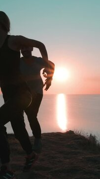 The happy couple have fun at the campsite near the sea. slow motion