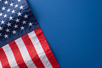 Symbolic item, like a wavy national flag, harmoniously placed on a blue background with an empty space, creating an inviting space for text or advertising during an Independence Day USA celebration