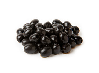Tasty black olives with leaves isolated on white background. Fresh fruit olives on a white background.