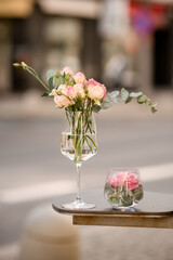Exclusive transparent vases with eustoma flovers and branches of green eucalyptus