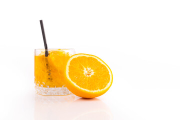 Orange cocktail with ice on a white background