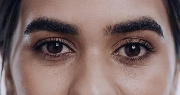 Face, opening eyes and closeup of woman for beauty, skincare and makeup cosmetics on eyebrows. Macro, eye portrait and female model microblading for natural dermatology, aesthetic and facial care.