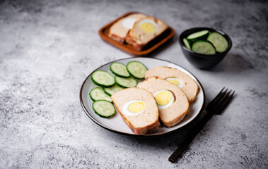 Chicken meatloaf with eggs in a plate
