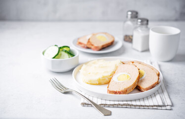 Chicken meatloaf with eggs in a plate