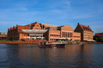 Baltic Philharmonic in Gdansk, small wooden Boat on the Motława, beautiful view